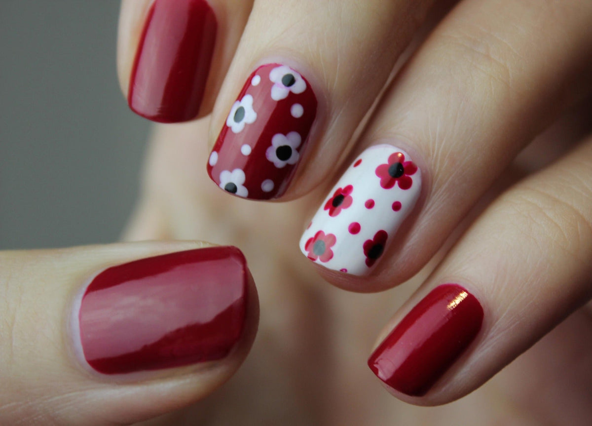 Nail art tools including UV lamp, nail drill, manicure brushes, nail polish, rhinestones and professional manicure accessories