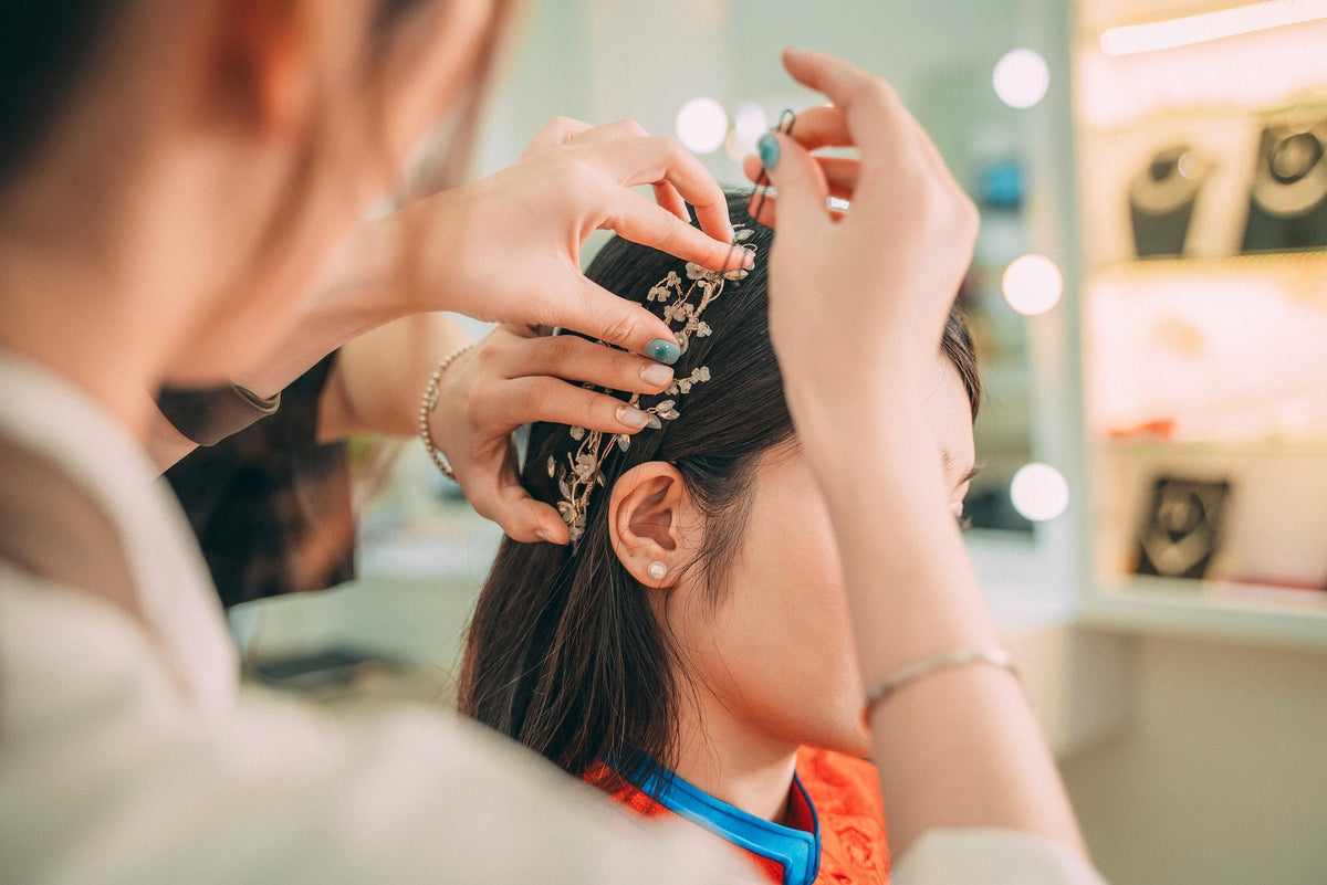 Hair accessories including hair clips, brushes, combs, headbands, scrunchies, and styling tools for everyday hair care and styling.