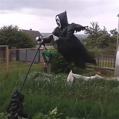 Halloween outdoor decorations skull scarecrow in garden