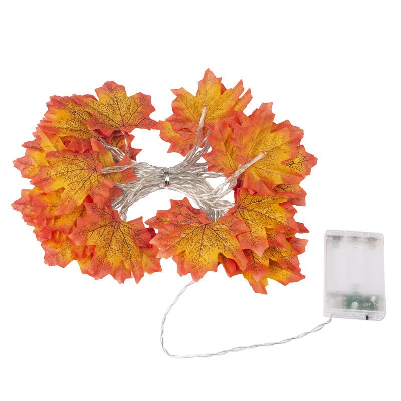 Halloween string lights with glowing maple leaves